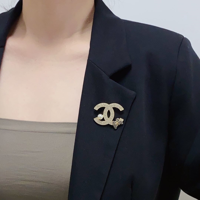 Ch**el brooches